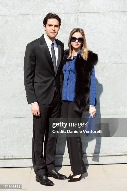 Ricardo Kaka and Carolina Celico attend the Giorgio Armani show during the Milan Fashion Week Womenswear Autumn/Winter 2014 on February 24, 2014 in...