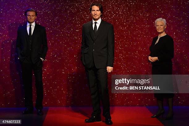 Picture shows wax figures of British actors Christian Bale and Judi Dench and US actor Leonardo DiCaprio at Madame Tussauds in London on February 24,...