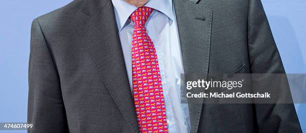 Controversial German economist and former board member of the German Deutsche Bundesbank Thilo Sarrazin wears a tie during the presentation of his...