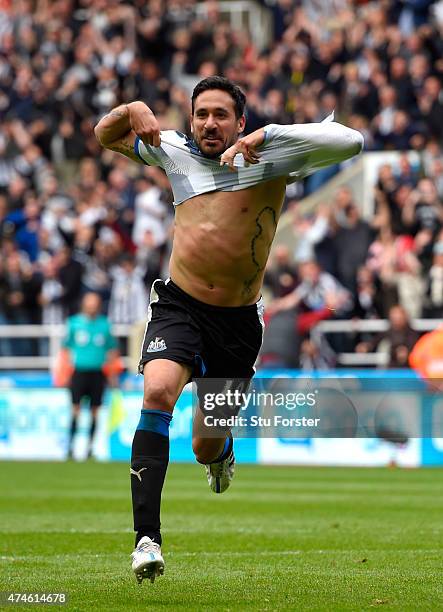 Jonas Gutierrez of Newcastle United celebrates scoring his team's second goal during the Barclays Premier League match between Newcastle United and...