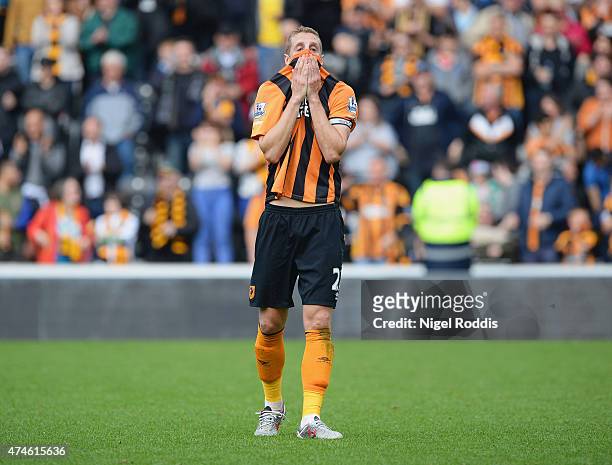 Michael Dawson of Hull City shows his dejection after relegated from the Premier League during the Barclays Premier League match between Hull City...