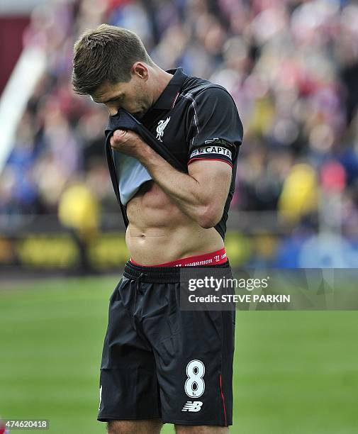 Liverpool's English midfielder Steven Gerrard leaves the pitch after playing his final game for Liverpool, after the English Premier League football...