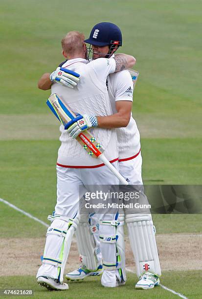 Ben Stokes of England celebrates scoring a century with Alastair Cook during day four of the 1st Investec Test match between England and New Zealand...