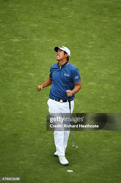 Byeong-Hun An of South Korea celebrates victory on the 18th green during day 4 of the BMW PGA Championship at Wentworth on May 24, 2015 in Virginia...
