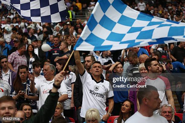 Preston fans cheer ahead of the League One play-off final between Preston North End and Swindon Town at Wembley Stadium on May 24, 2015 in London,...