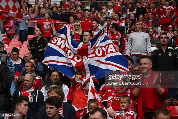 Swindon fans cheer ahead of the League One play-off final between Preston North End and Swindon Town at Wembley Stadium on May 24, 2015 in London,...