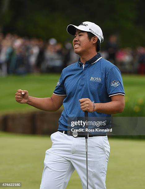 Byeong-Hun An of South Korea celebrates victory on the 18th green during day 4 of the BMW PGA Championship at Wentworth on May 24, 2015 in Virginia...