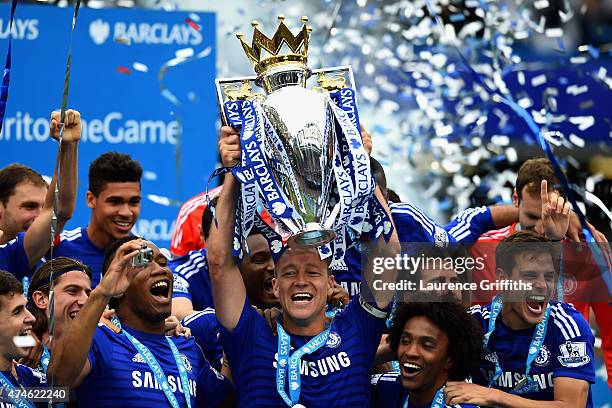 Captain John Terry of Chelsea lifts the trophy after the Barclays Premier League match between Chelsea and Sunderland at Stamford Bridge on May 24,...