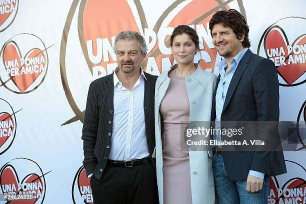 From left, director Giovanni Veronesi, actress Laetitia Casta and actor Fabio De Luigi attend 'Una Donna per Amica' photocall at Moderno Cinama on...