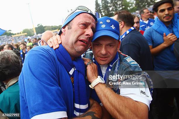 Fans of Darmstadt celebrate their team's promotion to the Bundesliga after the Second Bundesliga match between SV Darmstadt 98 and FC St. Pauli at...