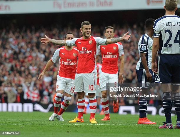 Jack Wilshere celebrates scoring the 3rd Arsenal goalduring the Barclays Premier League match between Arsenal and West Bromwich Albion at Emirates...