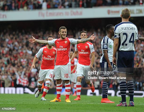 Jack Wilshere celebrates scoring the 3rd Arsenal goalduring the Barclays Premier League match between Arsenal and West Bromwich Albion at Emirates...
