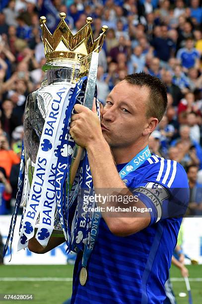 John Terry of Chelsea kisses the trophy after the Barclays Premier League match between Chelsea and Sunderland at Stamford Bridge on May 24, 2015 in...