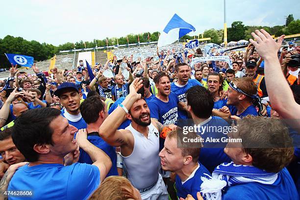 Team captain Aytac Sulu of Darmstadt and team mates celebrate after the Second Bundesliga match between SV Darmstadt 98 and FC St. Pauli at Stadion...