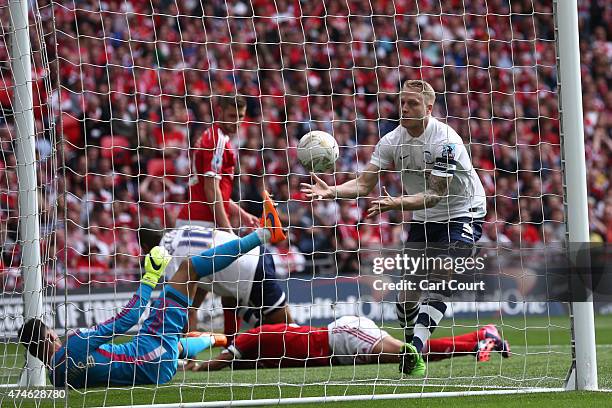 Tom Clarke of Preston North End celebrates after team mate scored during the League One play-off final between Preston North End and Swindon Town at...