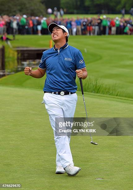 Korean golfer Byeong Hun An celebrates his victory on the 18th green after winning the PGA Championship at Wentworth Golf Club in Surrey, south west...