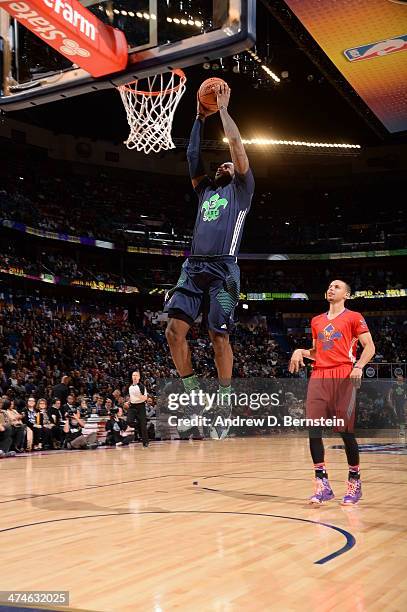 LeBron James of the Eastern Conference drives to the basket against the Western Conference during the 2014 NBA All-Star Game as part of the 2014...