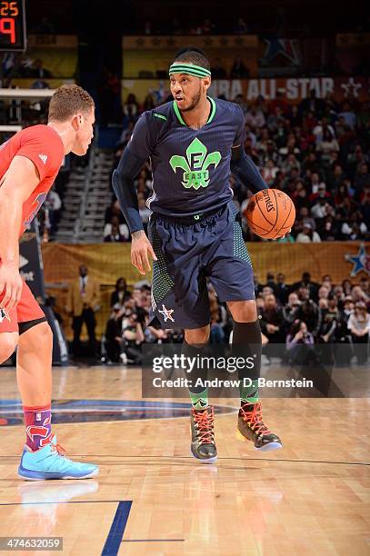 Carmelo Anthony of the Eastern Conference handles the ball against the Western Conference during the 2014 NBA All-Star Game as part of the 2014...