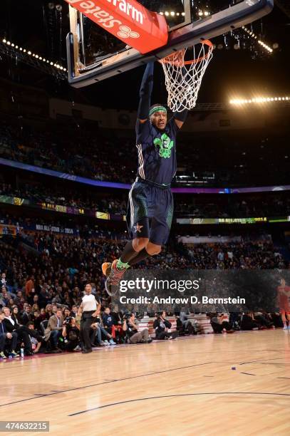 Carmelo Anthony of the Eastern Conference drives to the basket against the Western Conference during the 2014 NBA All-Star Game as part of the 2014...