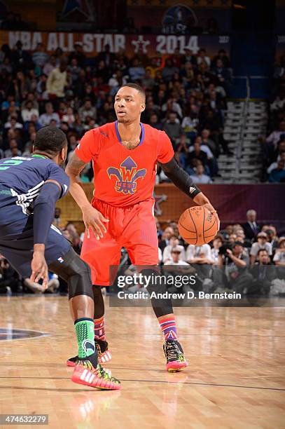 Damian Lillard of the Western Conference handles the ball against the Eastern Conference during the 2014 NBA All-Star Game as part of the 2014...