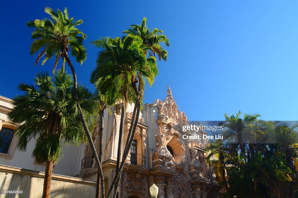 Spanish Colonial Revival building and palm trees in Balboa Park