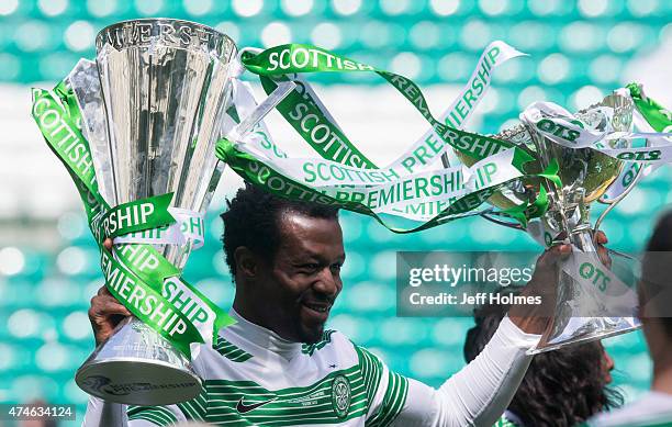 Efe Ambrose with both the League trophy and League cup as Celtic complete the double during the Scottish Premiership Match between Celtic and...