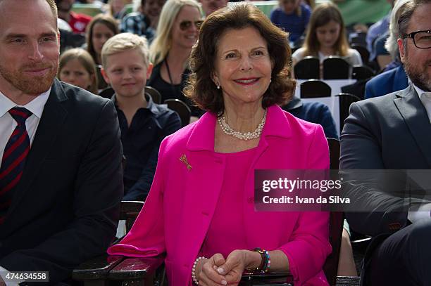 Chief Executive Officer Chister Fogelmarck, Queen Silvia of Sweden, CEO Grona Lund Magnus Widell attends The Childhood Day in Stockholm on May 24,...