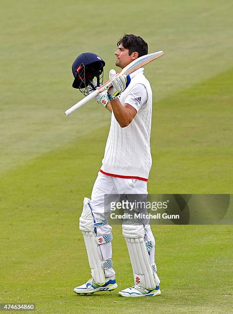 Alastair Cook of England celebrates scoring 150 runs during day four of the 1st Investec Test match between England and New Zealand at Lord's Cricket...