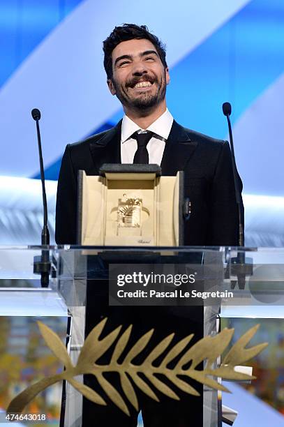 Director Ely Dagher speaks onstage after being awarded the Palme d'Or for his short film ' Waves '98' at the closing ceremony during the 68th annual...