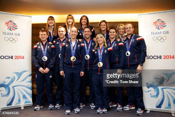 Team GB's medal winners including Lizzy Yarnold, David Murdoch and Eve Muihead pose for a picture during the Team GB Welcome Home Press Conference at...