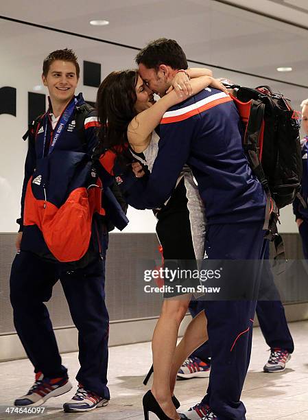 Men's Curling Silver medalist David Murdoch is greeted by his wife Stephanie Murdoch during the Team GB Welcome Home Press Conference at Heathrow...
