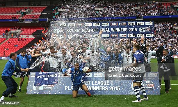 Preston North End players and staff celebrate after winning the League One play-off final between Preston North End and Swindon Town at Wembley...