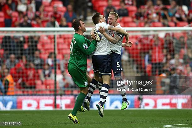 Preston North End players celebrate after winning the League One play-off final between Preston North End and Swindon Town at Wembley Stadium on May...