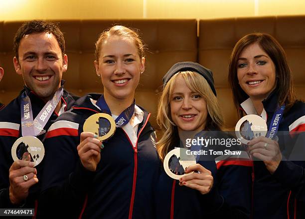 Team GB's medal winners David Murdoch, Lizzy Yarnold, Jenny Jones and Eve Muirhead pose for a picture with their medals during the Team GB Welcome...