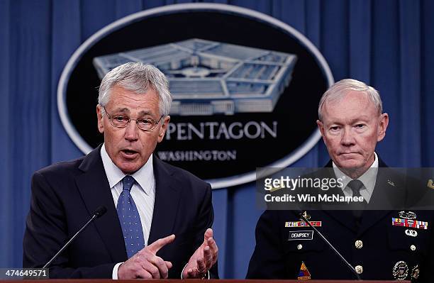 Secretary of Defense Chuck Hagel and Chairman of the Joint Chiefs of Staff Gen. Martin Dempsey answer questions during a press conference at the...