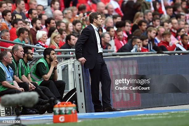 Swindon Town manager Mark Cooper looks on as his team lose to Preston North End in the League One play-off final between Preston North End and...