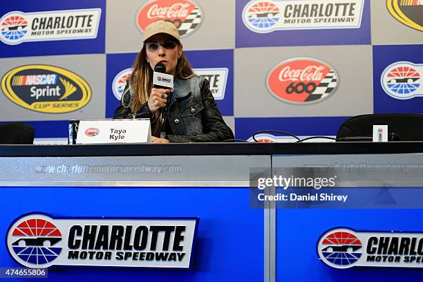 Taya Kyle, widow of American Sniper Chris Kyle, speaks to the media during a press conference prior to the NASCAR Sprint Cup Series Coca-Cola 600 at...