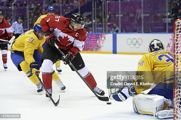 Winter Olympics: Canada Sidney Crosby in action, scoring goal to take 2-0 lead vs Sweden goalie Henrik Lundqvist during Men's Gold Medal Game at...