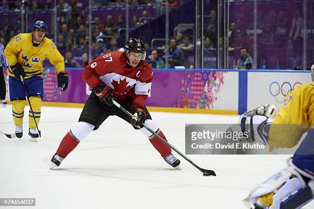 Winter Olympics: Canada Sidney Crosby in action, scoring goal to take 2-0 lead vs Sweden goalie Henrik Lundqvist during Men's Gold Medal Game at...