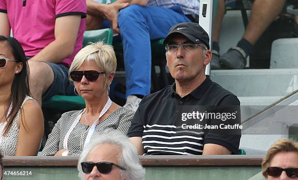 Louis-Paul Garcia, father and coach of Caroline Garcia and Mylene Garcia, her mother attend their daughter's match on day 1 of the French Open 2015...