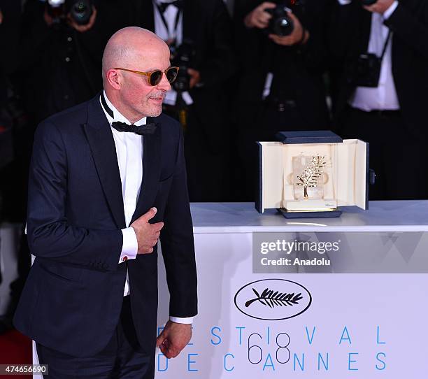 French director Jacques Audiard poses during the Award Winners photocall after he won the Palme d'Or award for 'Dheepan' at the 68th international...