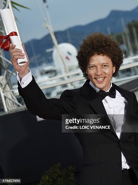 Mexican director Michel Franco poses during a photocall after he was awarded with the Best Screenplay prize for his film "Chronic" during the closing...