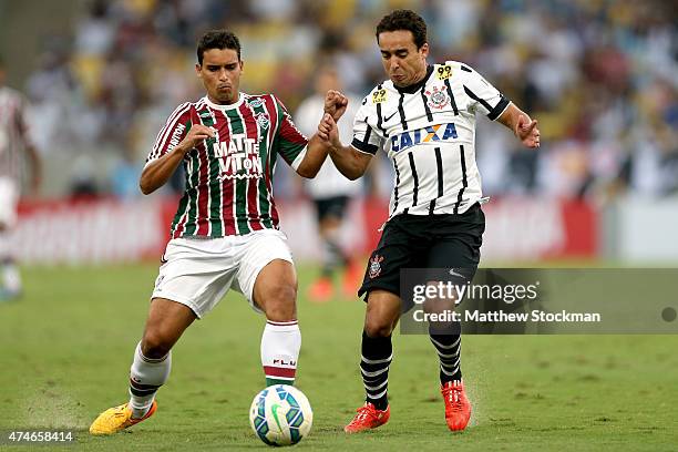 Renato of Fluminense and Jadson of Corinthians battle for control of the ball during their Brasileirao Series A 2015 match at Maracana Stadium on May...