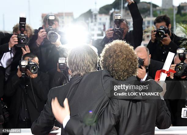 Mexican director Michel Franco poses with British actor Tim Roth during a photocall after he was awarded with the Best Screenplay prize for his film...