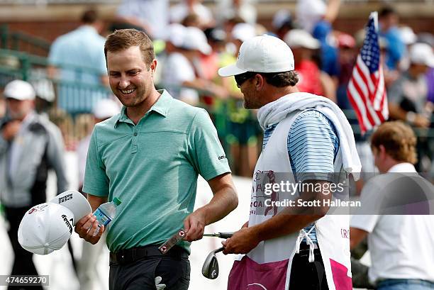 Chris Kirk celebrates on the 18th green during the final round of the Crowne Plaza Invitational at the Colonial Country Club on May 24, 2015 in Fort...