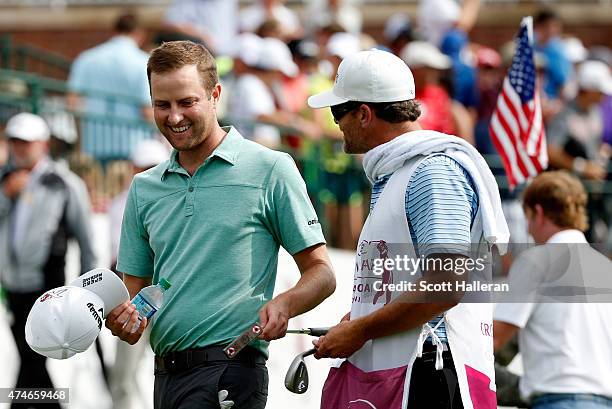 Chris Kirk celebrates on the 18th green during the final round of the Crowne Plaza Invitational at the Colonial Country Club on May 24, 2015 in Fort...