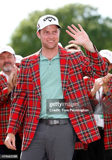 Chris Kirk waves after winning during the final round of the Crowne Plaza Invitational at the Colonial Country Club on May 24, 2015 in Fort Worth,...