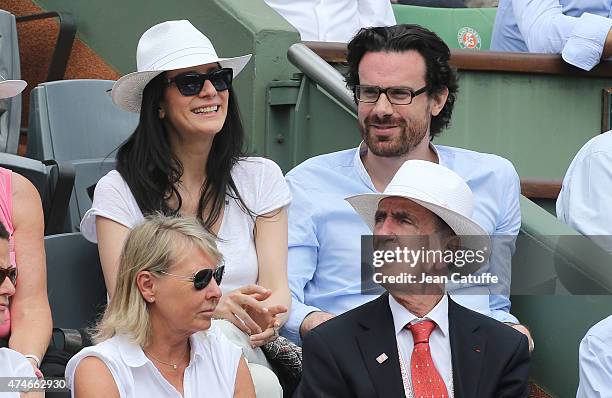 Marie Drucker and her boyfriend Mathias Vicherat attend day 1 of the French Open 2015 held at Roland Garros stadium on May 24, 2015 in Paris, France.