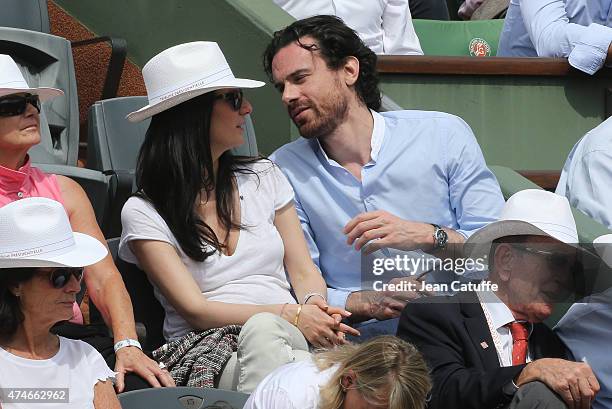 Marie Drucker and her boyfriend Mathias Vicherat attend day 1 of the French Open 2015 held at Roland Garros stadium on May 24, 2015 in Paris, France.