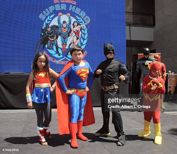 Fans dressed as Wonder Woman, Superman, Batman and The Flash at Warner Bros. And DC Comics Super Hero World Record Event held at Hollywood & Highland...